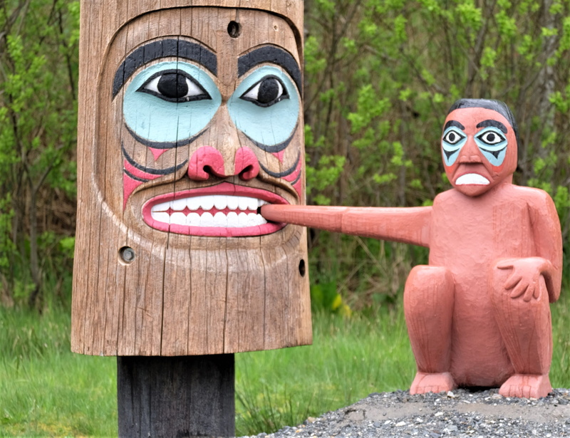 body part, bizarre, robot, accessory, totem, emblem, human, human body part, male likeness, costume, day, tiki, disguise, art and craft, fun, building