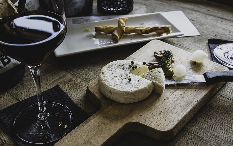 food and drink, swiss cheese, still life, table, cutting board, freshness, table knife, refreshment, plywood, seasoning, tray, wellbeing, brie, drink, temptation