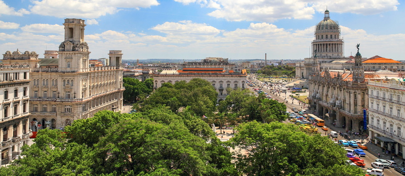 the past, cuba, communist, tourism, sky, government, castro, building exterior, history, built structure, cloud - sky, cars, cityscape, church, past splendor