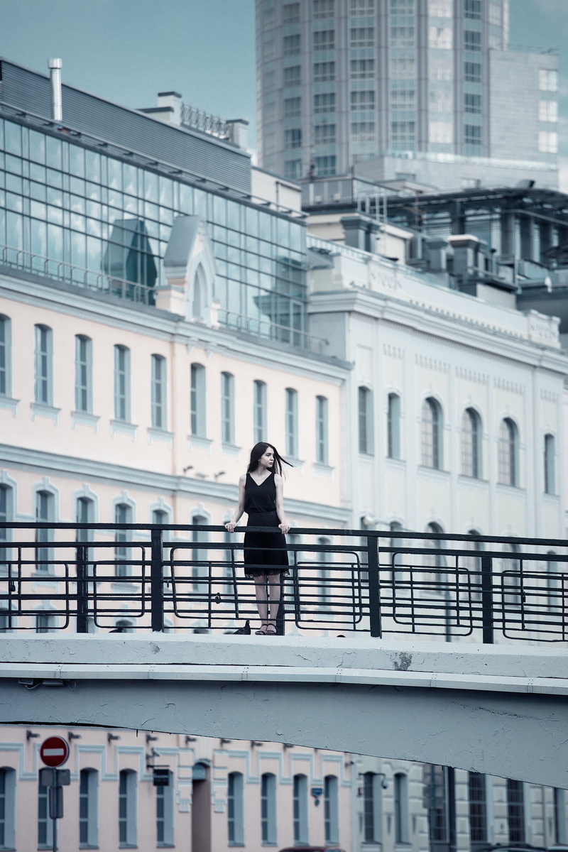 building, gray, one person, warm clothing, woman in black, skyscrapers, buildings, ukraine hotel, daytime, outdoors, office building exterior, river, the skyscraper on kudrinskaya square