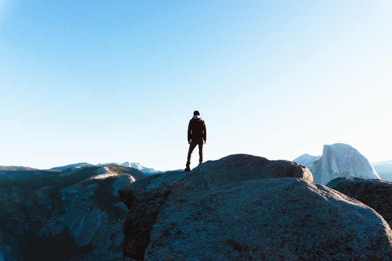 danger, scenics - nature, ledge, glacier point, mountain range, sky, solid, rear view, dirt road, mountain peak, full length, cliff, peak, human, rock - object