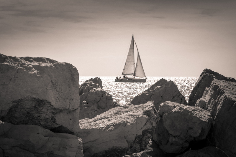 sailboat, travel, peace, outdoors, day, rock formation, sailing, rock, monochrome, sea, sports, rocks, boat, architecture, nature, place of worship, shore