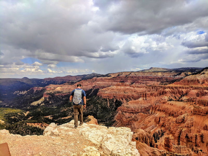 rock formation, hiker, leisure activity, looking at view, rock - object, men, environment, non-urban scene, sky, united states, standing, person, mountain