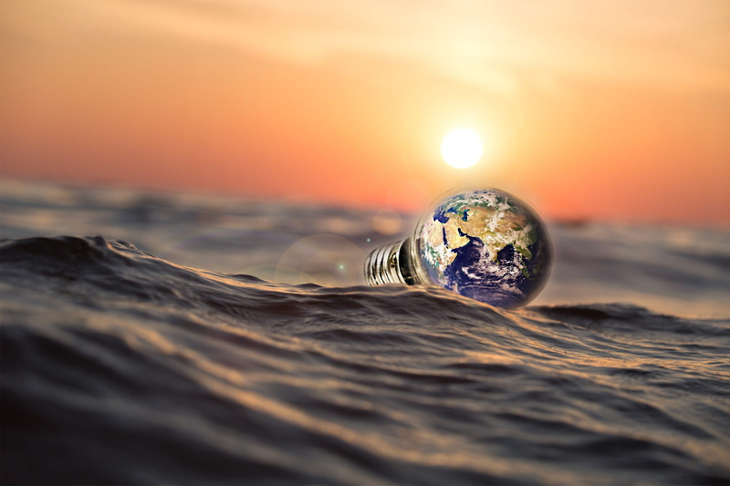 floating, close-up, sunset, sphere, float, land, seascape, sea, bulb, selective focus, blue, single object, sun, surface level, outdoors, no people, tide