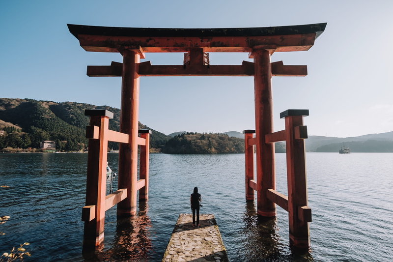 one person, person, front, standing, shrine, pier, rear view, 4K, tranquility, red, sky, lake, japan, water, outdoors, built structure, nature, mountain