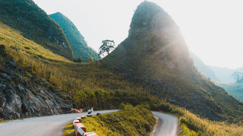 non-urban scene, the way forward, crest, wanderlust, road trip, sunrise, tranquility, scenics - nature, mountain range, mountain road, daytime, perspective