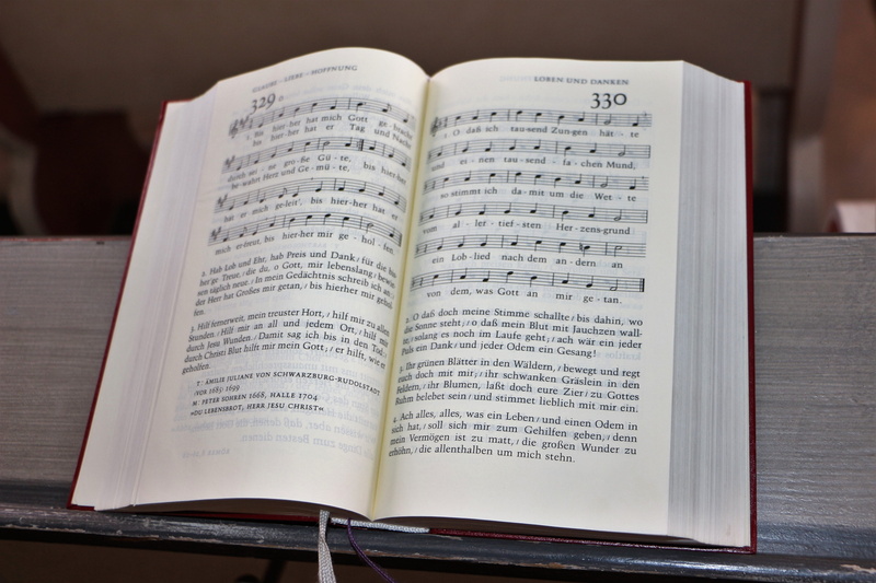 western script, indoors, open, faith, God, musical note, 5K, sheet music, high angle view, sheet, Praise, eyeglasses, text, paper, Prayer Book, no people