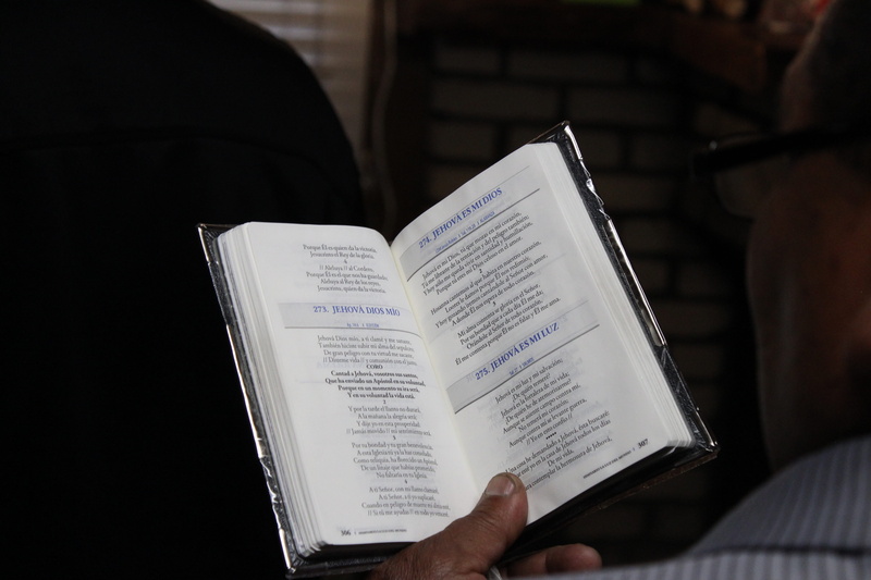 resurrection, hymnal, holding, hand, forgiveness, christian, publication, catholic, jesus, light, one person, spirituality, personal perspective, bible