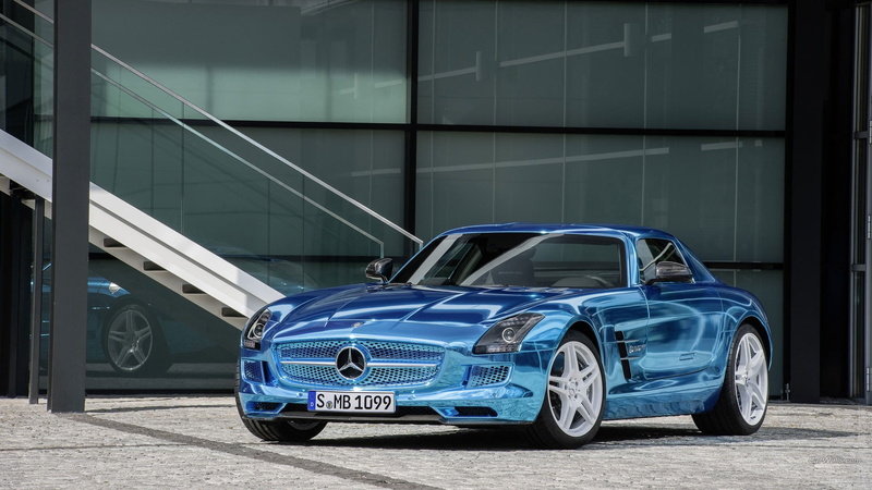 motor vehicle, no people, transportation, building exterior, day, blue, motion, garage, vintage car, wealth, Mercedes SLS, built structure, concrete, luxury