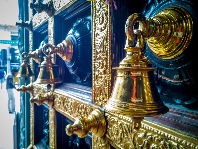 lighting equipment, indoors, no people, ring, close, symbol, bells, architecture, photography, hindu, craft, sculpture, creativity, metal, silver colored