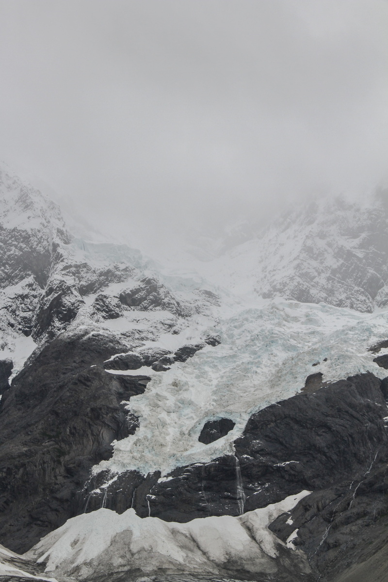 sky, mountain peak, snow, chile, no people, beauty in nature, travel, fog, cold temperature, winter, scenics - nature, rock - object, cordillera del paine