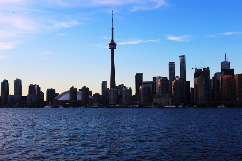 travel destinations, water, silhouette, building, canon, skyscraper, building exterior, spire, blue, sky, office building exterior, urban skyline, skyline