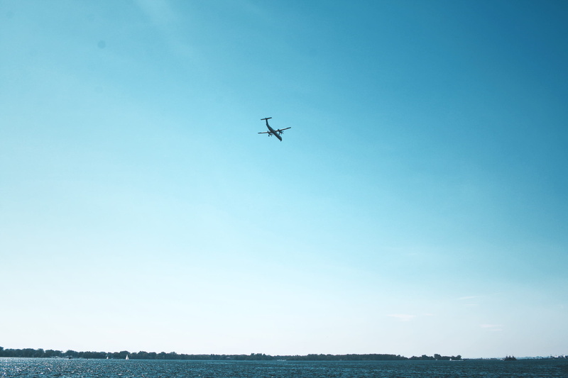 mid-air, golden hour, minimal, on the move, silhouette, air vehicle, canada, beauty in nature, plane, flying, travel, transportation, no people, mode of transportation