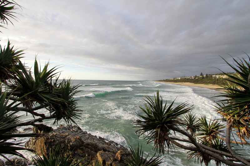 no people, wafe, wave, horizon over water, beach, ocean, hill, coconut palm tree, sky, rocky, sea, stormy, land, tranquility, motion, sandy, plant, tropical climate
