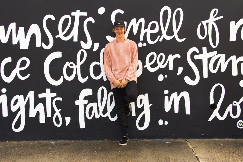 front view, happy, one person, van, leaning, adult, cap, blackboard, portrait, businessman, success, ring, background, communication, strip, wall, text
