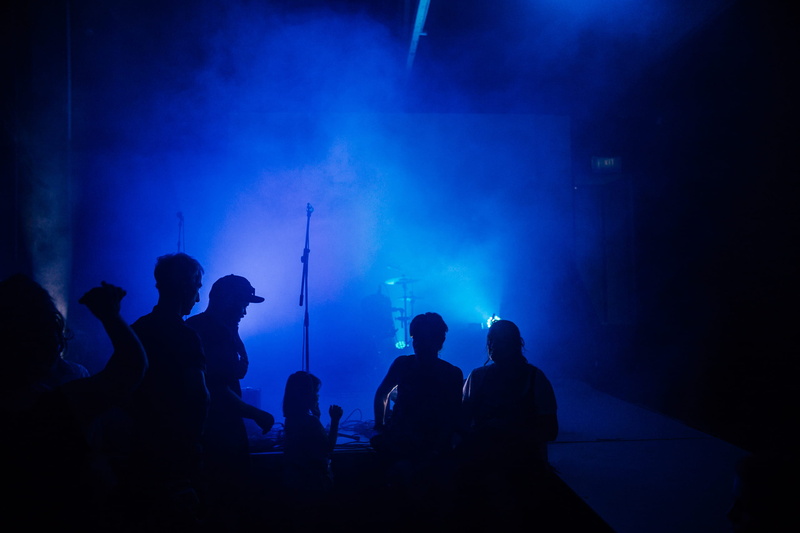 arts culture and entertainment, stage, rock music, musician, black, music, event, stage - performance space, illuminated, artist, men, gig, crowd, enjoyment