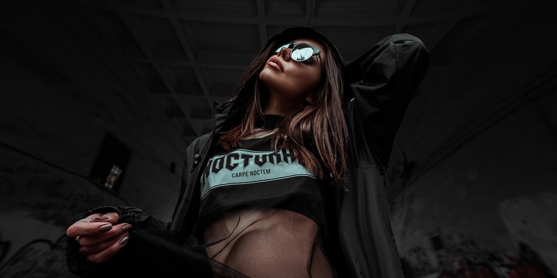 holding, fisheye lens, leisure activity, lifestyles, black jackets, casual clothing, model, brunette, beautiful woman, sunglasses, women outdoors, outdoors