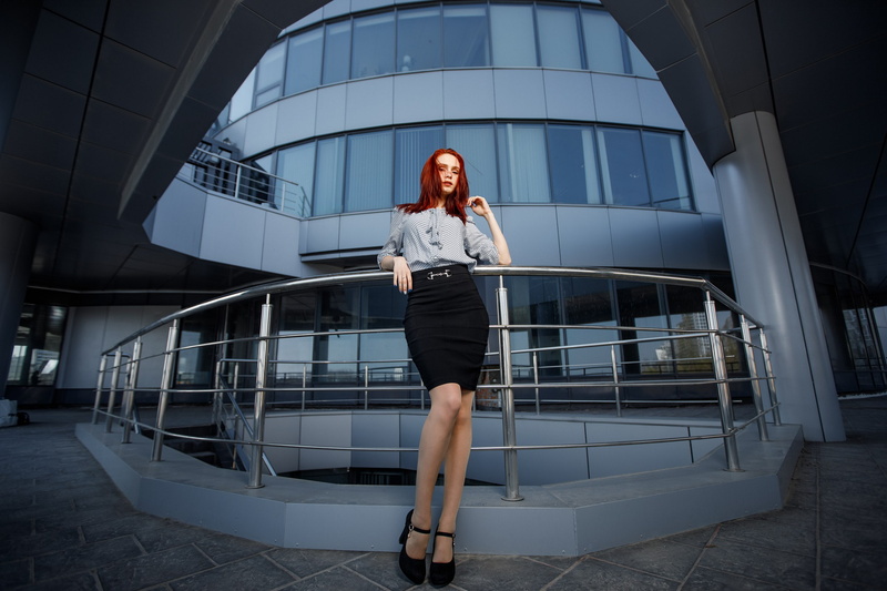 fisheye lens, skirt, model, blouses, women outdoors, painted nails, redhead, building, women, outdoors, 2K, portrait, looking at viewer, black skirts