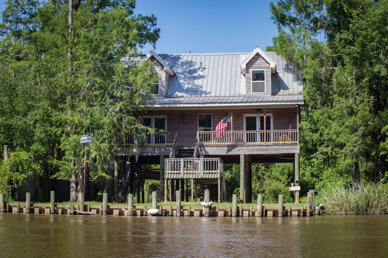 louisiana, new orleans, no people, waterfront, usa, water, architecture, green color, flag, trees, 5K, house, sky, luxury, united states, slidell, blue