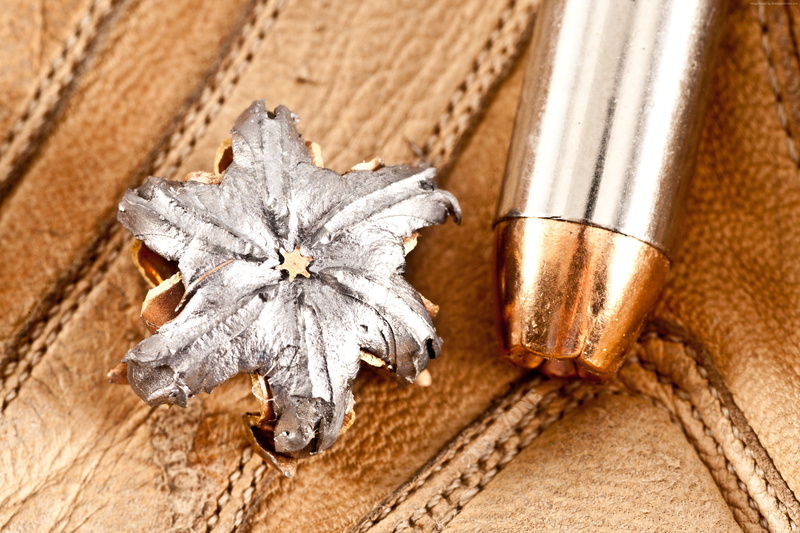 close up, discharged bullet, 4K, bullet, open point, leather, mushroom bullet, dumdum