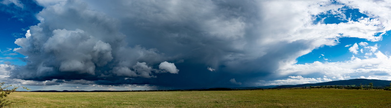 storm cloud, land, cloudscape, ominous, 8K, field, wind, environment, outdoors, dramatic sky, panoramic, green, cloud - sky, no people, forward, cloudburst