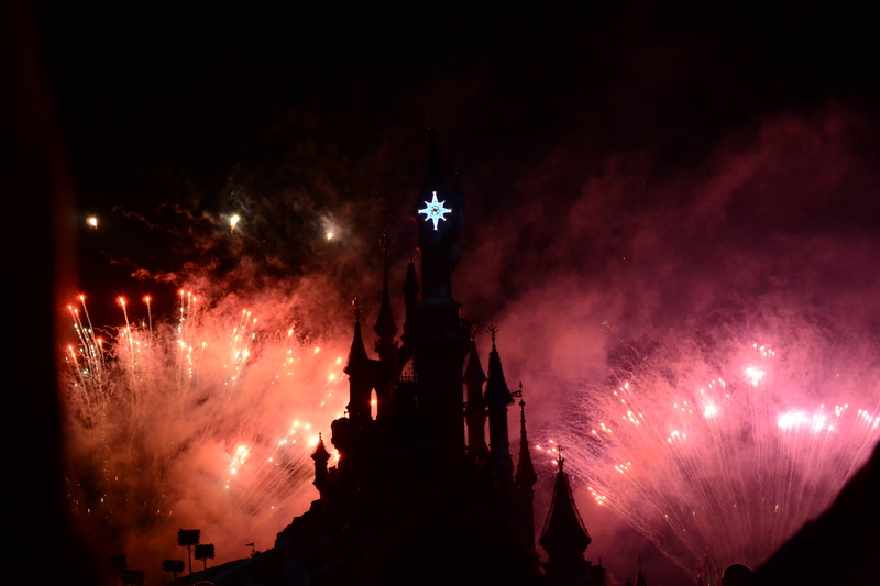 travel destinations, fireworks, building exterior, children, people, disney castle, city, celebration, firework display, built structure, low angle view