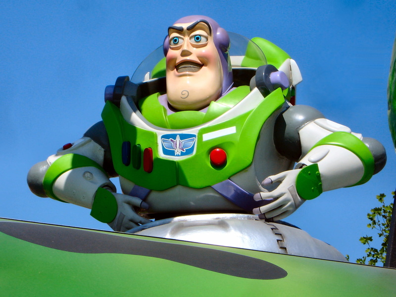 toy story, representation, daytime, looking at camera, clothing, people, day, buzz, Paris, disney parade, buzz lightyear, sky, multi colored, sport, front view