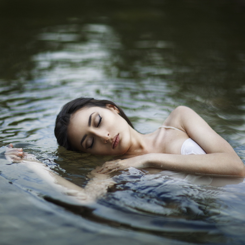 luxury, brunette, eyeliner, young adult, relaxation, headshot, water, beautiful woman, outdoors, women outdoors, portrait, wet body, adult, lying down