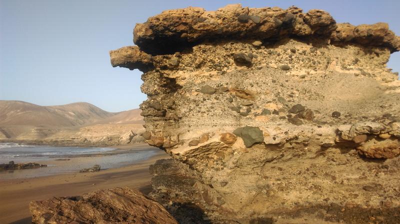 physical geography, land, sea, wild, nature, fuerteventura, no people, sky, beauty in nature, mountains, canary islands, landscape, day, rock formation