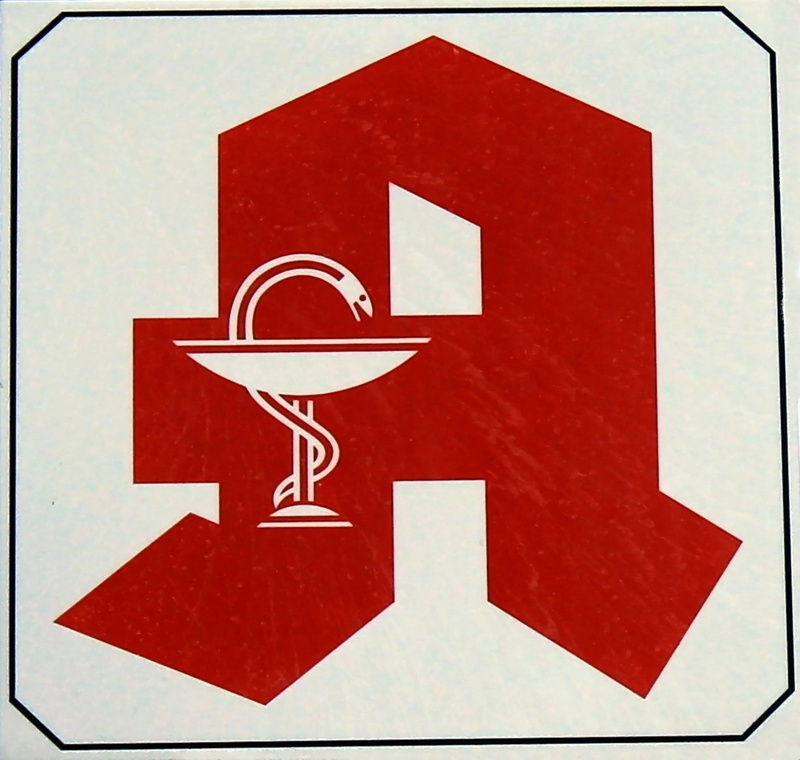 road, geometric shape, sign, caption, arrow symbol, communication, advertising, symbol, directional sign, close-up, shape, pharmacy, information, information sign