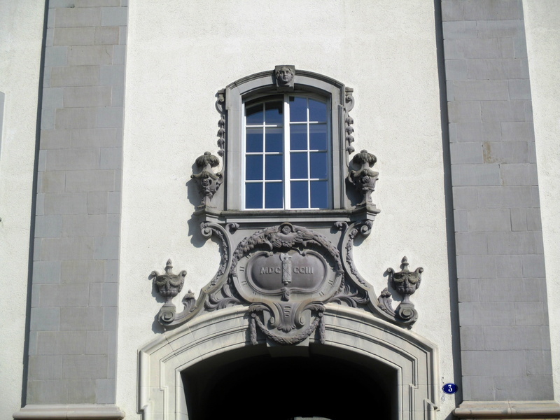 east entrance, architecture, male likeness, 4K, day, no people, built structure, window caption, abbey district, sunlight, roman numerals, switzerland