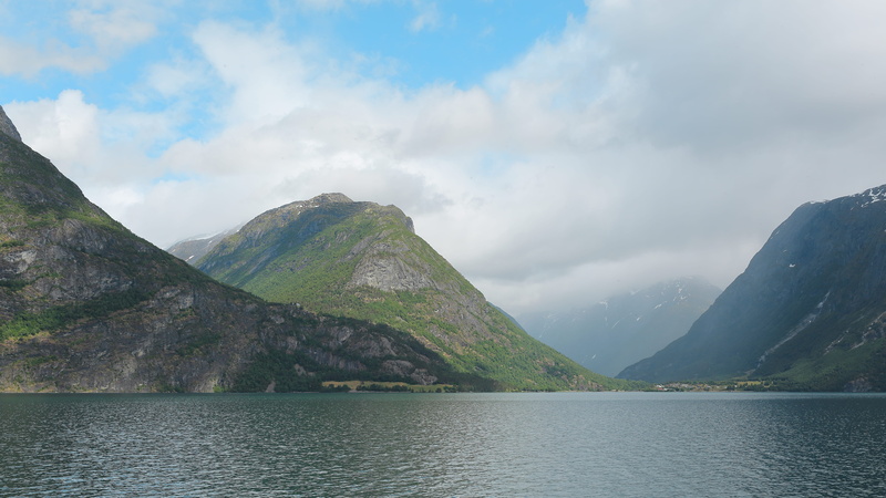 sky, water, tranquil scene, no people, waterfront, mountains, remote, idyllic, fiord, nature, fjord, mountain, outdoors, clouds, lake, cloud - sky, mountain peak
