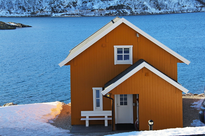 house, travel, snow, tromso, white, building exterior, water, fishermen cabin, beach, no people, cold temperature, fjord, wooden, building, sky, mountain