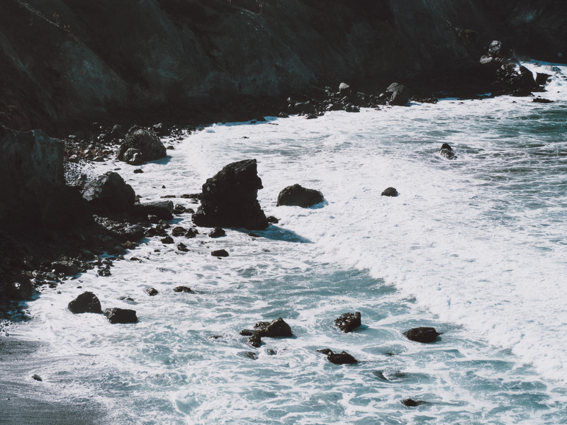 tranquil scene, bashing, daytime, day, solid, rocky, cold temperature, tide, no people, flowing, rock formation, water, outdoors, seashore, rock, wafe