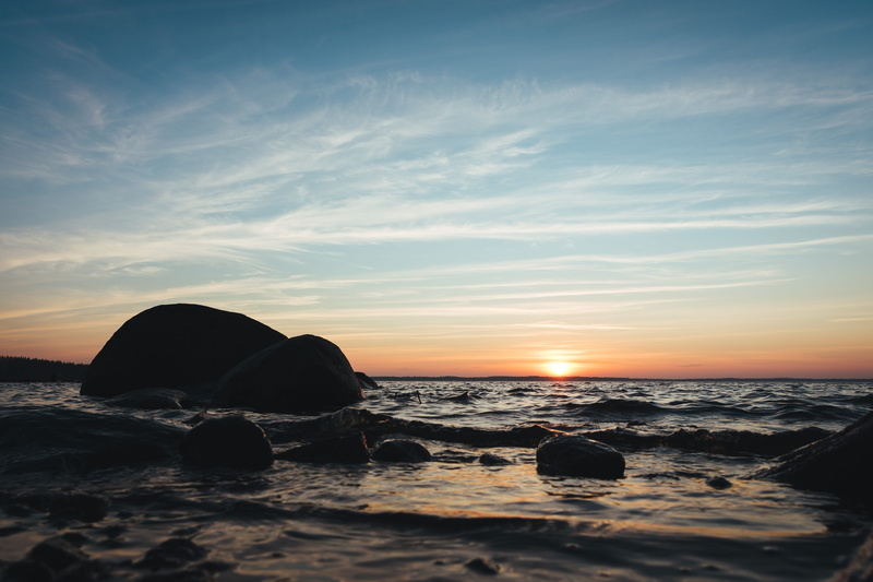 dawn, sunlight, scenics - nature, light, nature, tent, sunrise, flare, ocean, horizon, dusk, promontory, outdoors, orange color, rocks, water, solid, beach