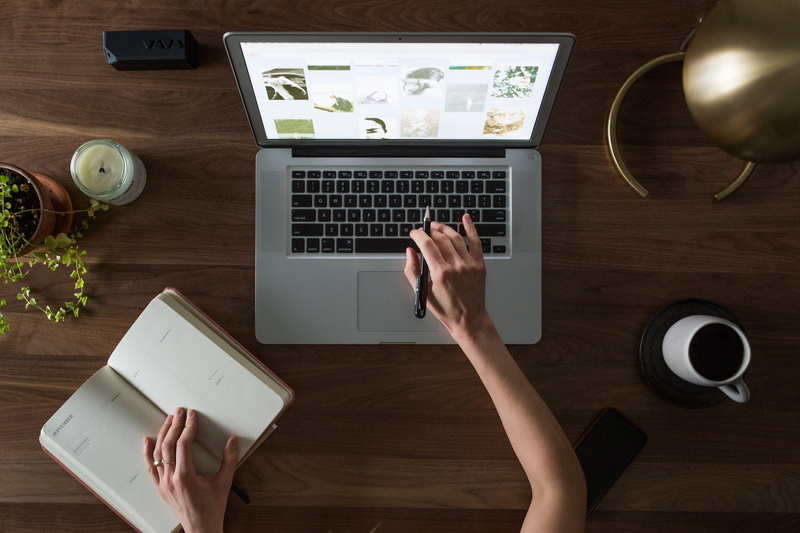 one person, using, adult, pro, research, table, computer, study, desk, mug, macbook, wood - material, communication, office, high angle view, work, hand