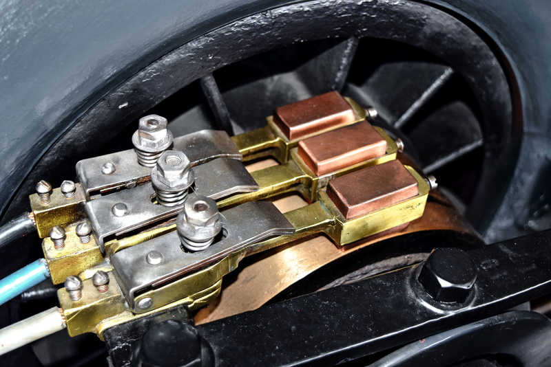 high angle view, black color, flow, stator, carbon brushes, gold colored, still life, indoors, coin, machinery, connection, technology, close-up, car, no people