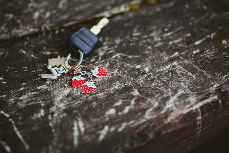 number, high angle view, wooden, chance, wood, decoration, creativity, key, tree stump, close-up, textured, art and craft, outdoors, key ring, rock - object