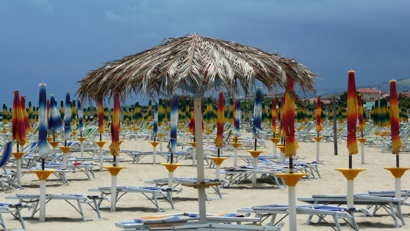 umbrella, sea, day, land, italy, nature, table, sunshade, tranquility, arrangement, outdoors, blue sky, water, no people, parasol, sunlight, seat, protection