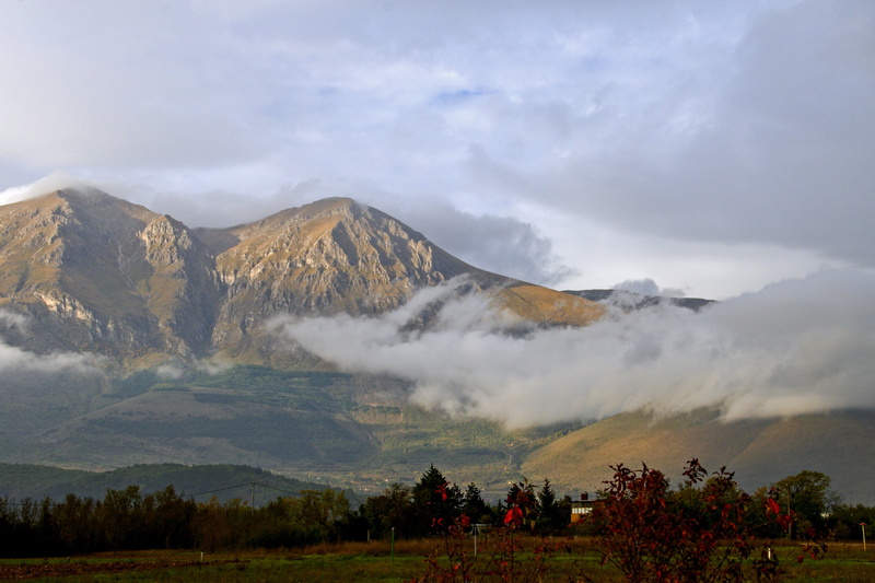 environment, day, non-urban scene, mist, tree, abruzzo, mountain peak, beauty in nature, 2K, sky, mount velino, cloud - sky, tranquility, plant, outdoors