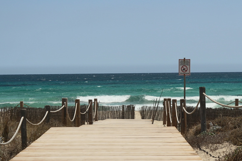 coastal, direction, walk, scenics - nature, wood - material, sign, pier, horizon, sea, horizon over water, clear sky, water, outdoors, path, sky, travel destinations