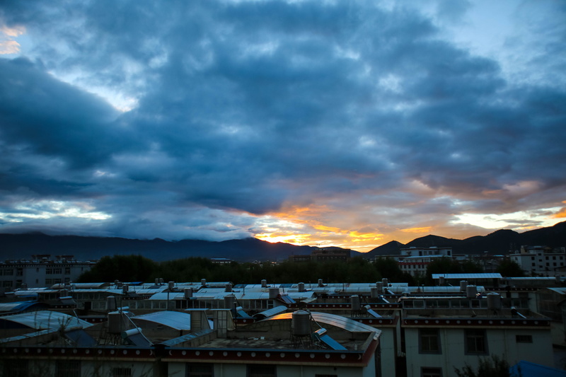 dramatic sky, townscape, shangri-la, storm cloud, deqen, building, residential district, xianggelila, china, overcast, built structure, sky, cloud - sky