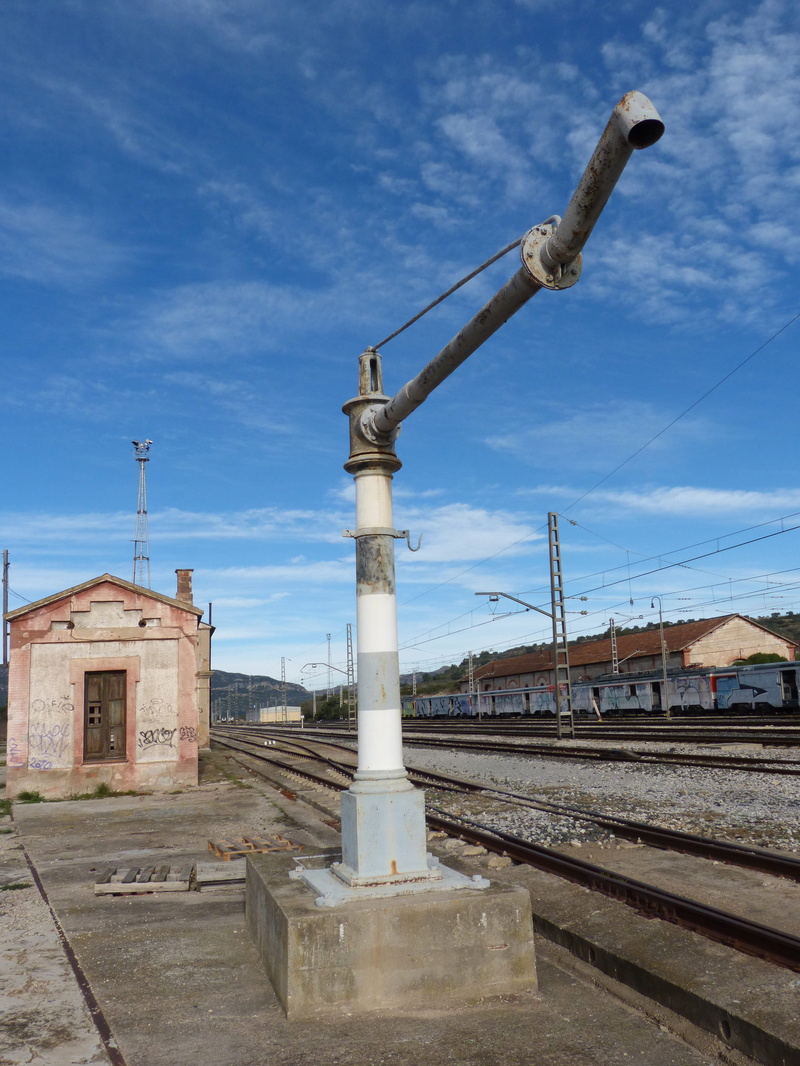 railroad track, Water, built structure, no people, city, rail transportation, outdoors, belief, religion, Railway, old, Aguada, industry, Train, sky, sunlight