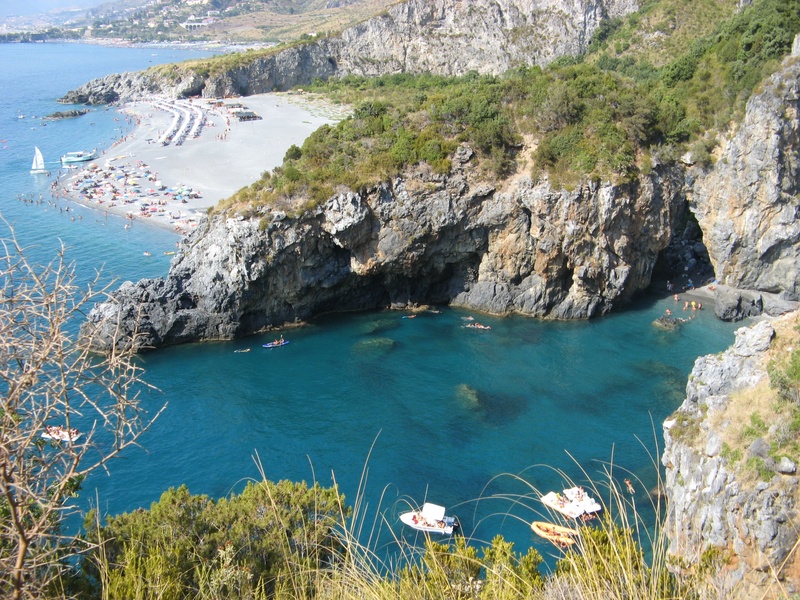 formation, rocky coastline, beauty in nature, rocks, sun, calabria, summer, water, scenics - nature, turquoise colored, view, eye, high angle view, mountain
