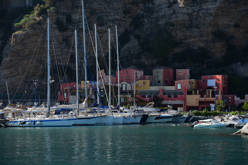sea, liguria, sailboat, nautical vessel, houses, water, waterfront, speedboat, outdoors, mode of transportation, boats, boat, no people, pole, harbor, landscape