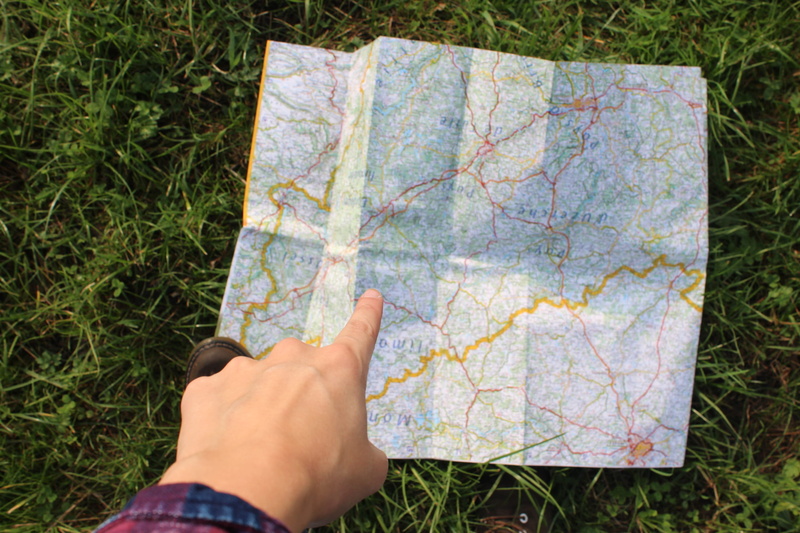 human body part, adventurer, one person, maps, grass, guidance, high angle view, human hand, land, leisure activity, 2K, nature, map, exploration, holding