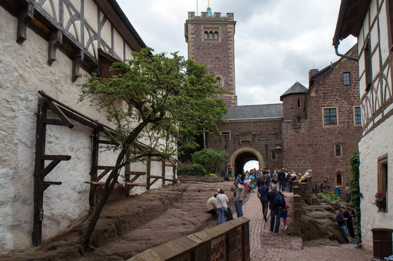 men, outdoors, lifestyles, world heritage, women, people, wartburg castle, day, walking, the past, plant, leisure activity, building exterior, castle, group of people