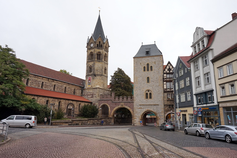 sky, motor vehicle, car, building, clock, europe, building exterior, the past, architecture, spire, eisenach, travel, road, religion, city street, germany