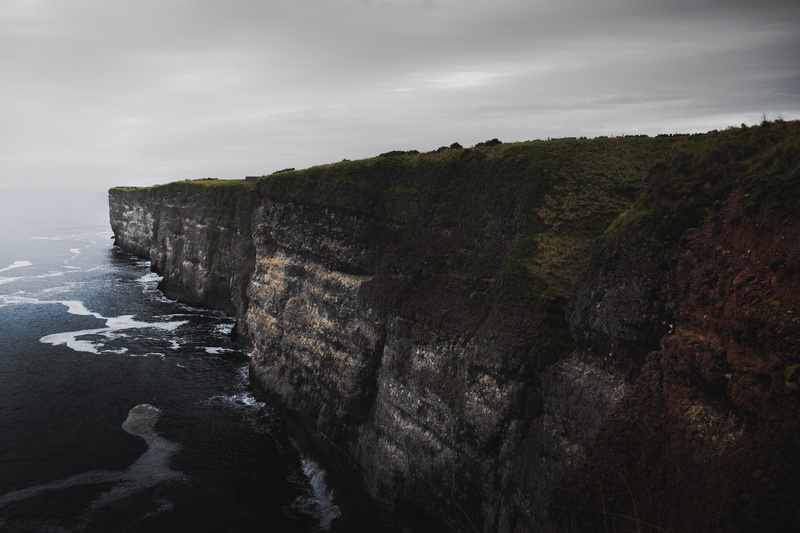 beach, scenics - nature, nature, ocean, rock formation, day, no people, rock - object, cliff, s, mountain, tranquility, cloud - sky, solid, beside, sky