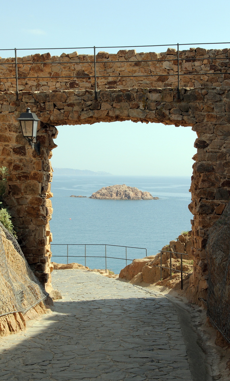 land, stone, castle, beach, island, water, beauty in nature, day, tranquility, solid, europe, tranquil scene, spain, arch, old, no people, rock, mediterranean